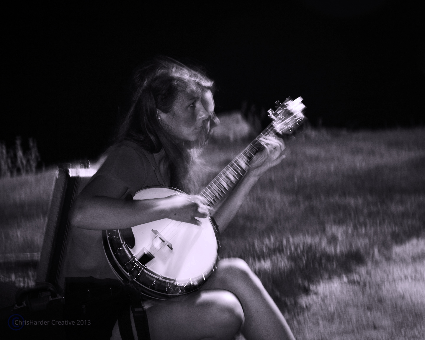 jamming by the water after performing at the street festival August 4, 2013